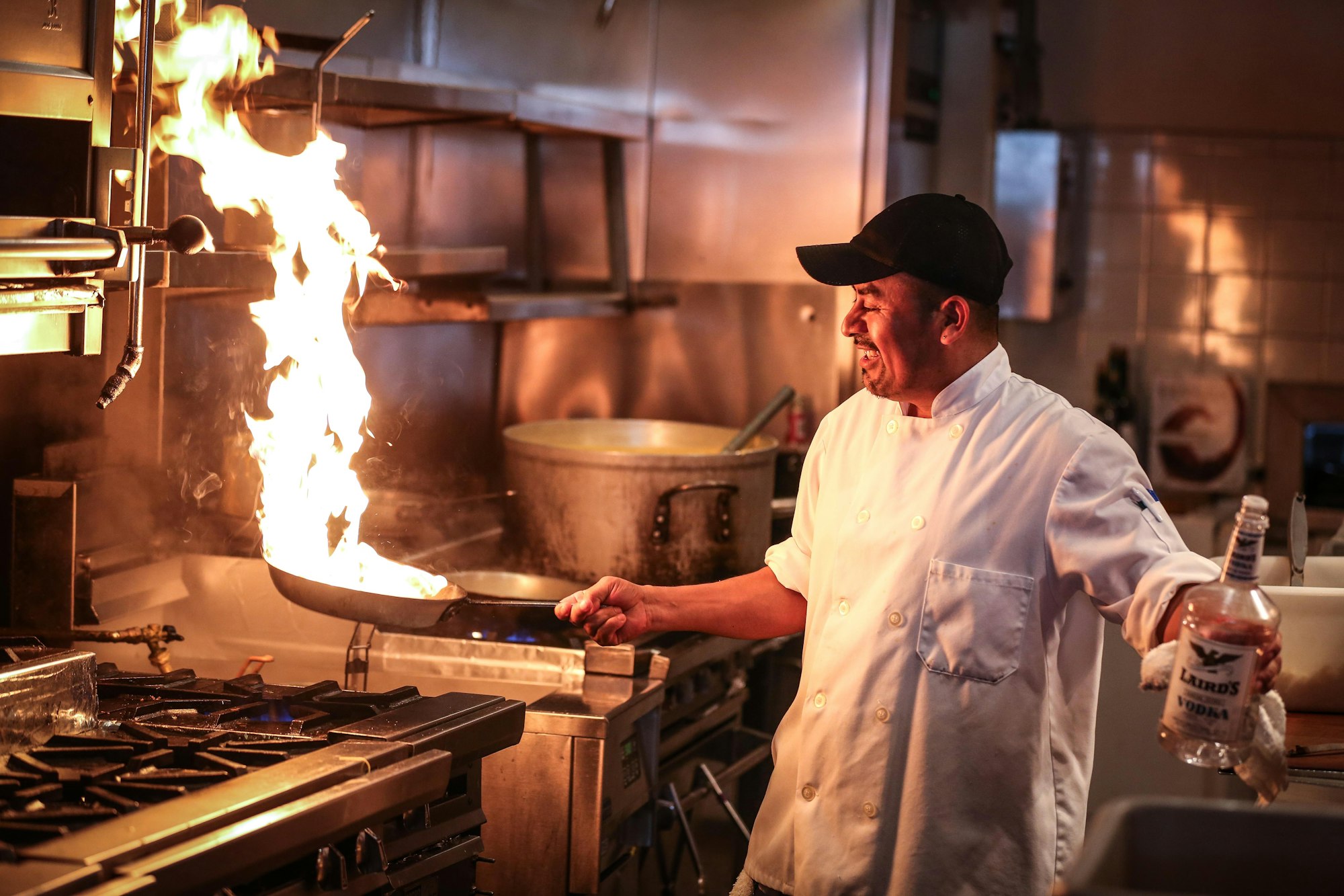 Commercial kitchen cookware in active restaurant service